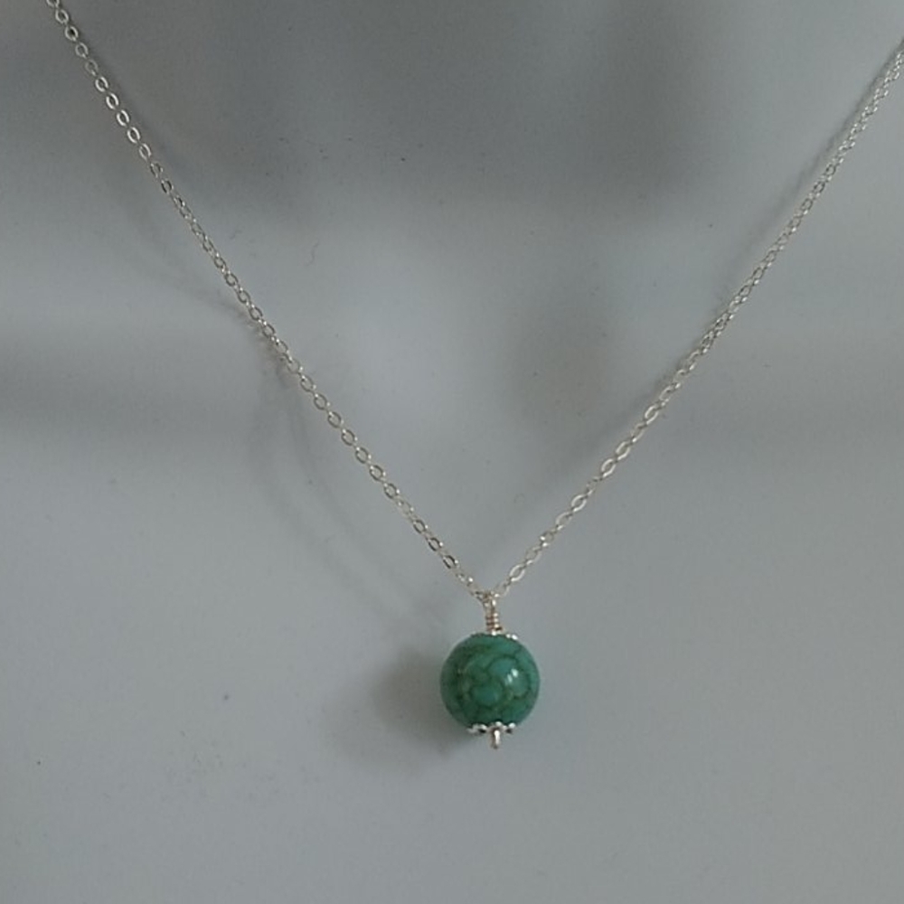 Sterling silver necklace with turquoise pendant